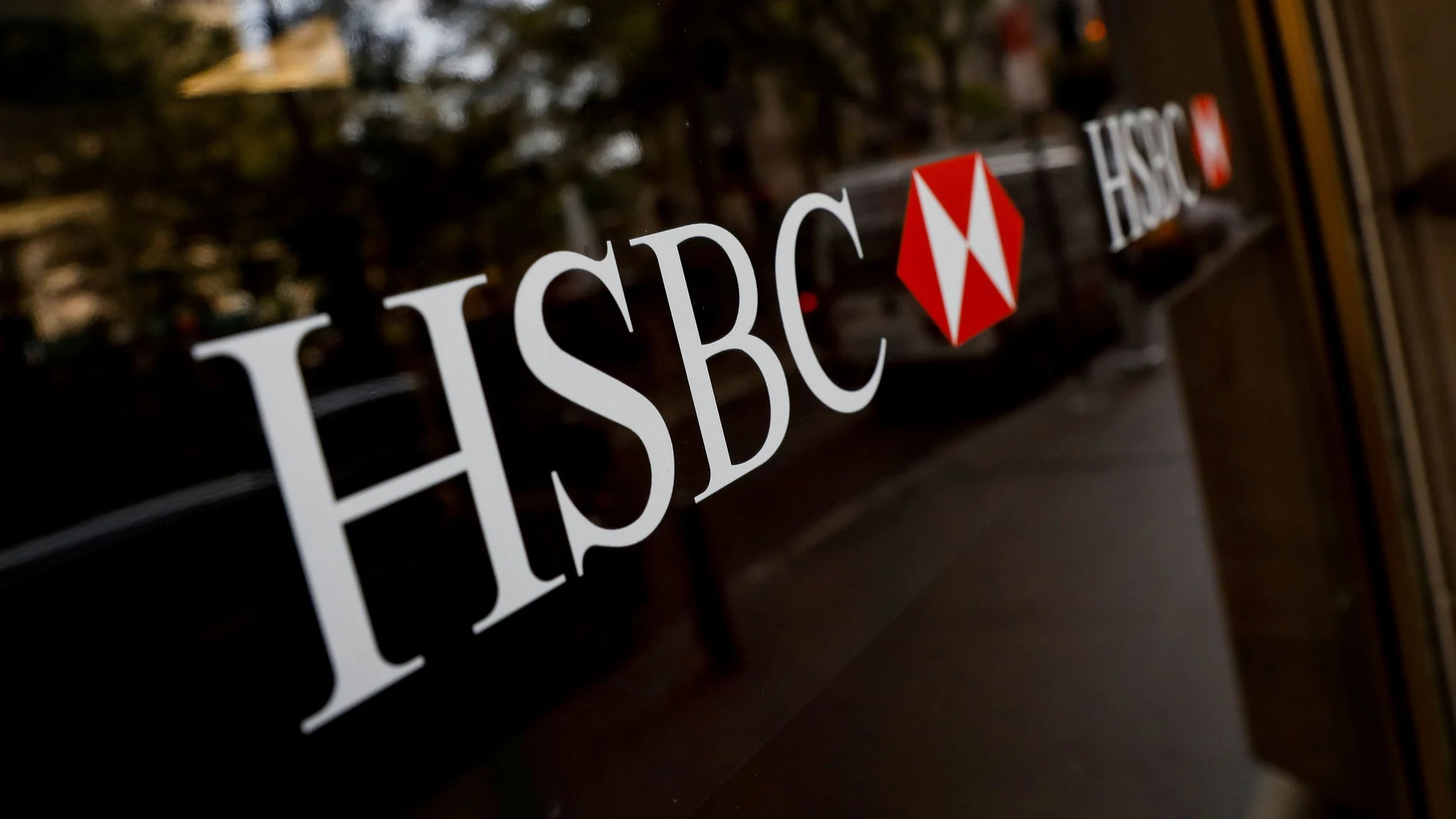 FILE PHOTO: HSBC logos are seen on a branch bank in the financial district in New York