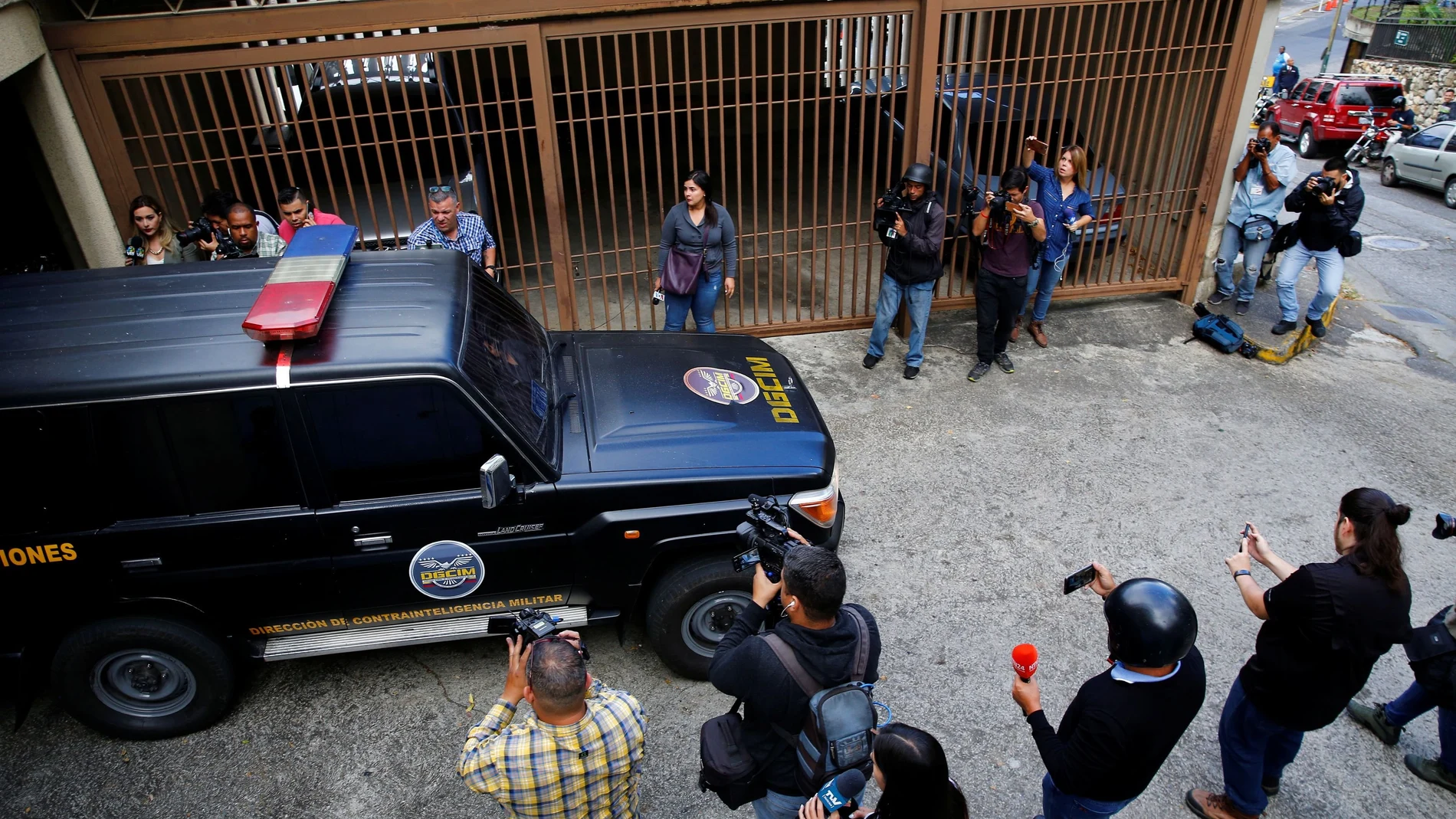 A vehicle of Directorate General of Military Counterintelligence leaves the building where Juan Marquez, uncle of Venezuela's opposition leader Juan Guaido, lives, in Caracas