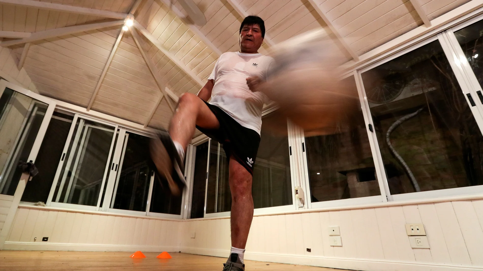 Former Bolivian President Evo Morales exercises at his home, in Buenos Aires