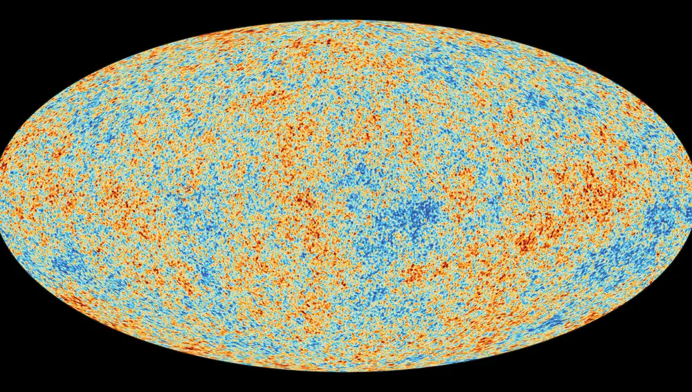 El fondo cósmico de microondas es un “mapamundi del universo observable” tal y como era cuando tenía 379.000 años. En él vemos zonas más más calientes y densas (en azul, la escala es contraria a la intuición) y otras más frías y difusas (rojo), pero la escala está exagerada para que podamos apreciar las diferencias. En realidad, la diferencia entre las regiones más rojas y las más azules es de menos de una milésima de grado.