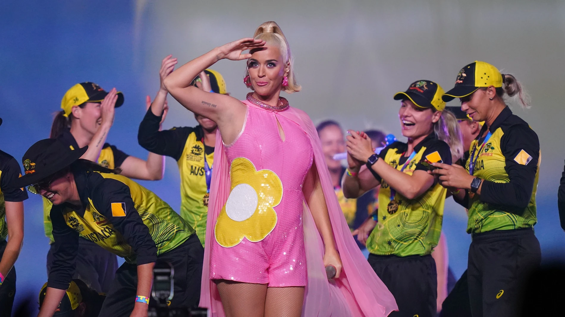 Katy Perry performs on stage with the Australian women's cricket team after the Women's T20 World Cup final match between Australia and India at the MCG in Melbourne, Sunday, March 8, 2020. (AAP Image/Scott Barbour) NO ARCHIVING, EDITORIAL USE ONLY, IMAG