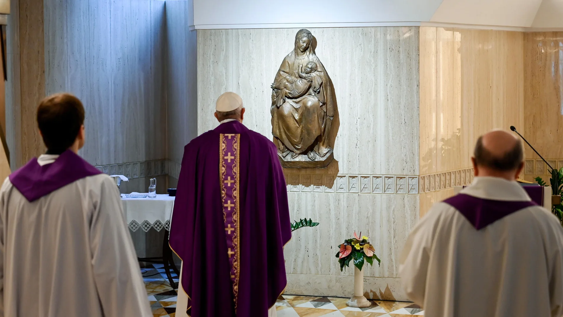 Pope Francis celebrates a lone mass