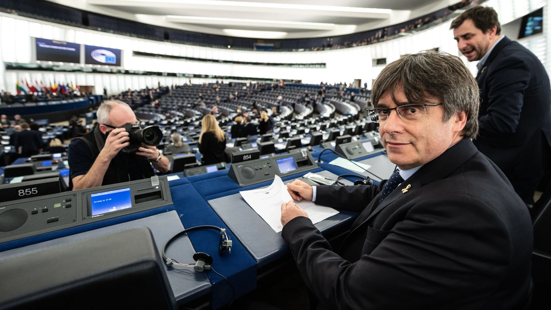 Former members of the Catalan government Toni Comin (R) and Carles Puigdemont (L) wait for their first plenary session as member of the European Parliament in Strasbourg, France, 13 January 2020.