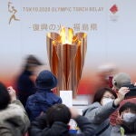 La antorcha olímpica no lucirá en Tokio hasta 2021