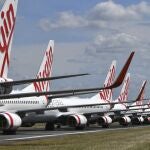 Aviones de la aerolínea Virgin Australia aparcados en el aeropuerto de Brisbane (Australia)