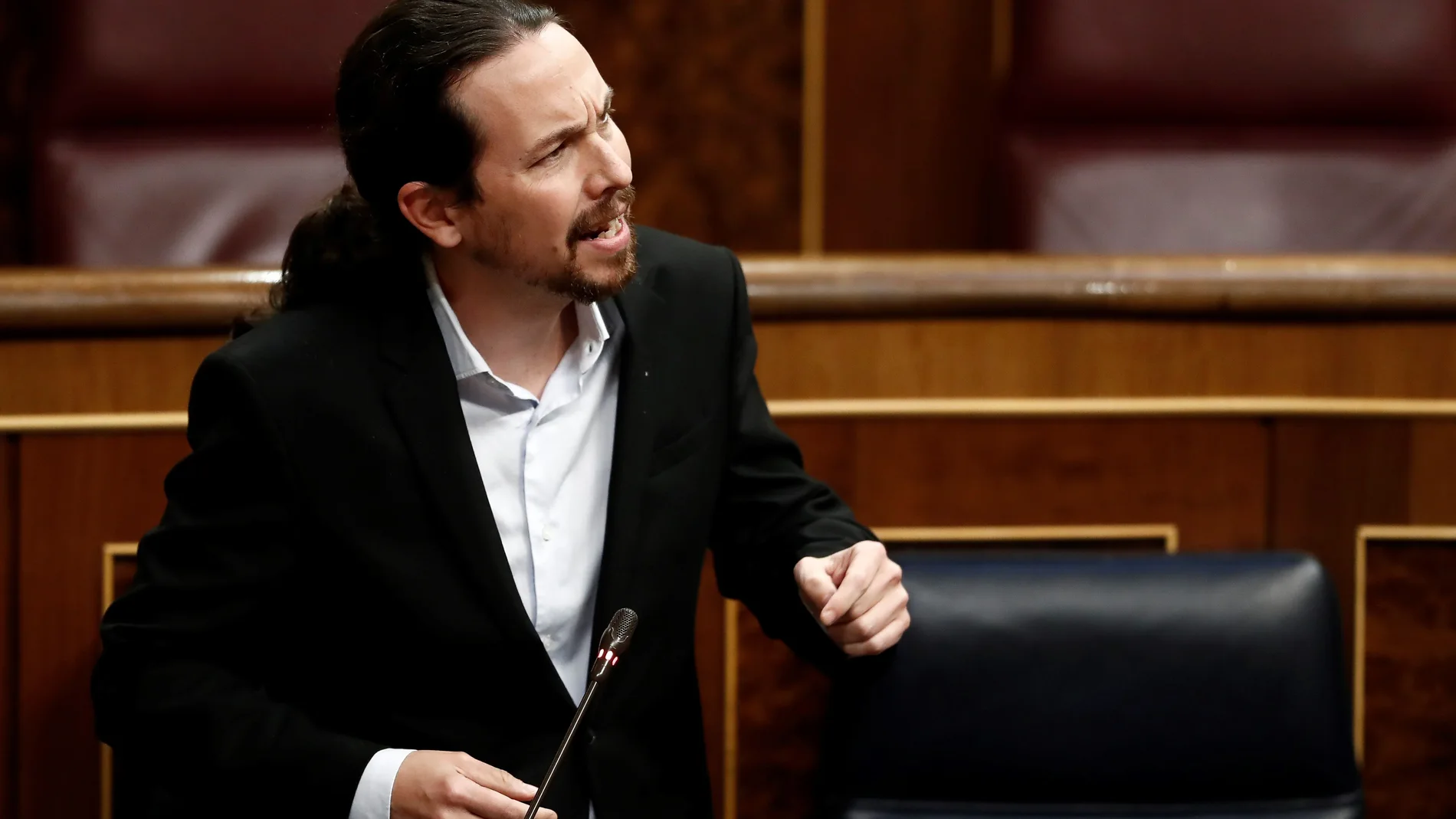 El vicepresidente segundo y ministro de Derechos Sociales, Pablo Iglesias, durante el pleno celebrado este miércoles en el Congreso, donde el gobierno expone los resultados de los últimos consejos europeos y los motivos por los que solicita una nueva prórroga del estado de alarma.