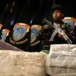 FILE PHOTO: Peruvian police display to the media almost two tonnes of cocaine at the police headquarters in Lima, Peru, March 8, 2019. REUTERS/Guadalupe Pardo/File Photo