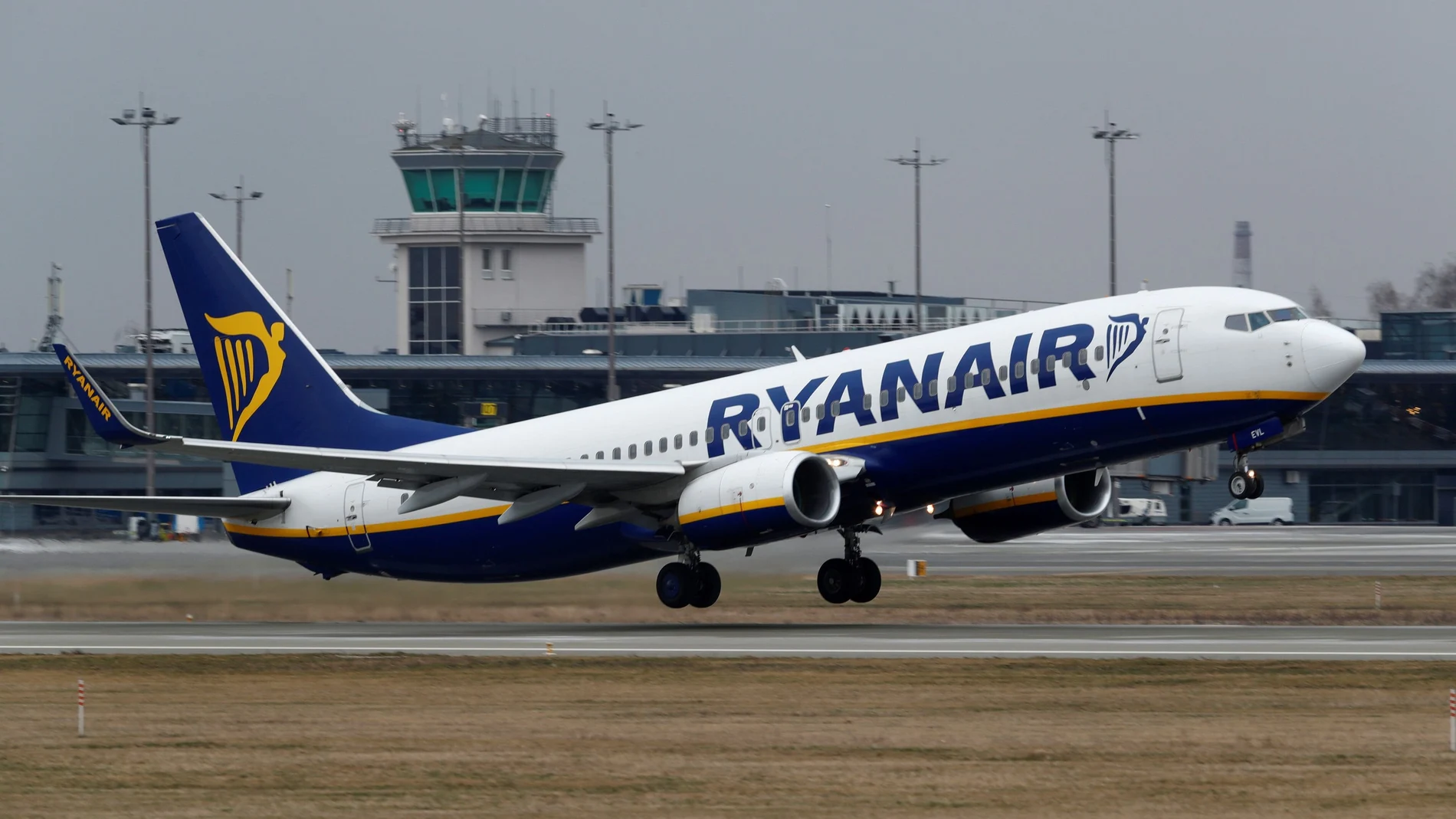 FILE PHOTO: Ryanair Boeing 737-8AS plane takes off in Riga, Latvia, March 16, 2020