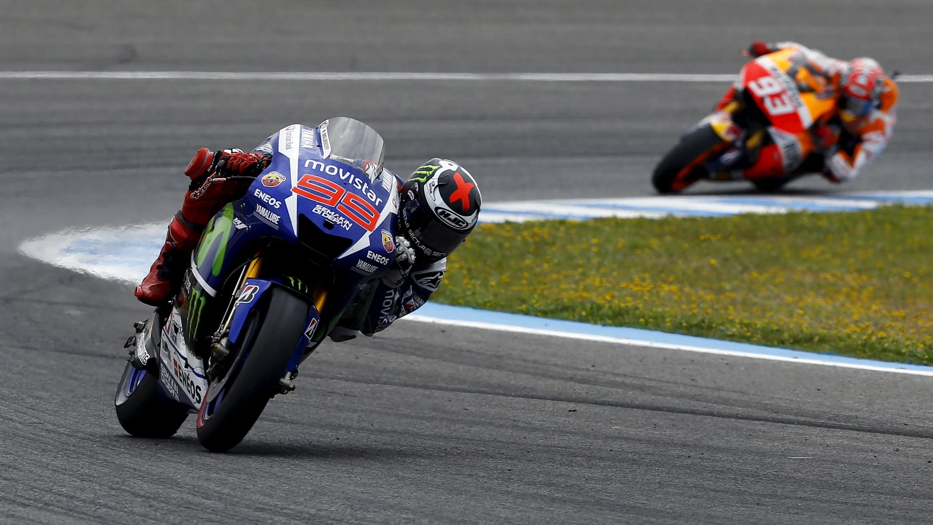 FILE PHOTO: Yamaha rider Jorge Lorenzo leads Honda rival and fellow Spaniard Marc Marquez at the Spanish Grand Prix in Jerez