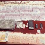 Dinero falso y cocaína localizados en una peluquería de Hortaleza, Madrid