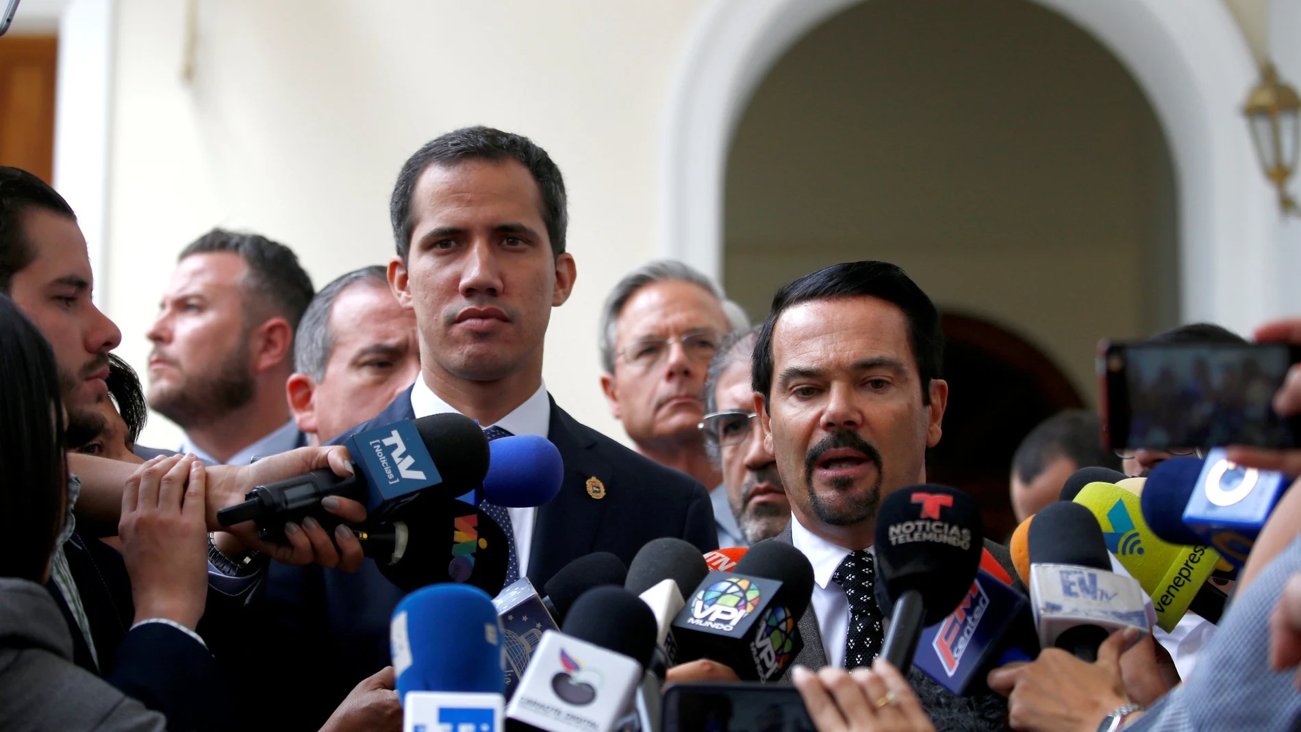 FILE PHOTO: French ambassador to Venezuela Romain Nadal delivers a news conference next to Venezuelan opposition leader Juan Guaido and accredited diplomatic representatives of the European Union in Caracas
