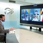 El presidente del Partido Popular (PP), Pablo Casado durante su reunión telemática con sus presidentes autonómicos/ Tarek