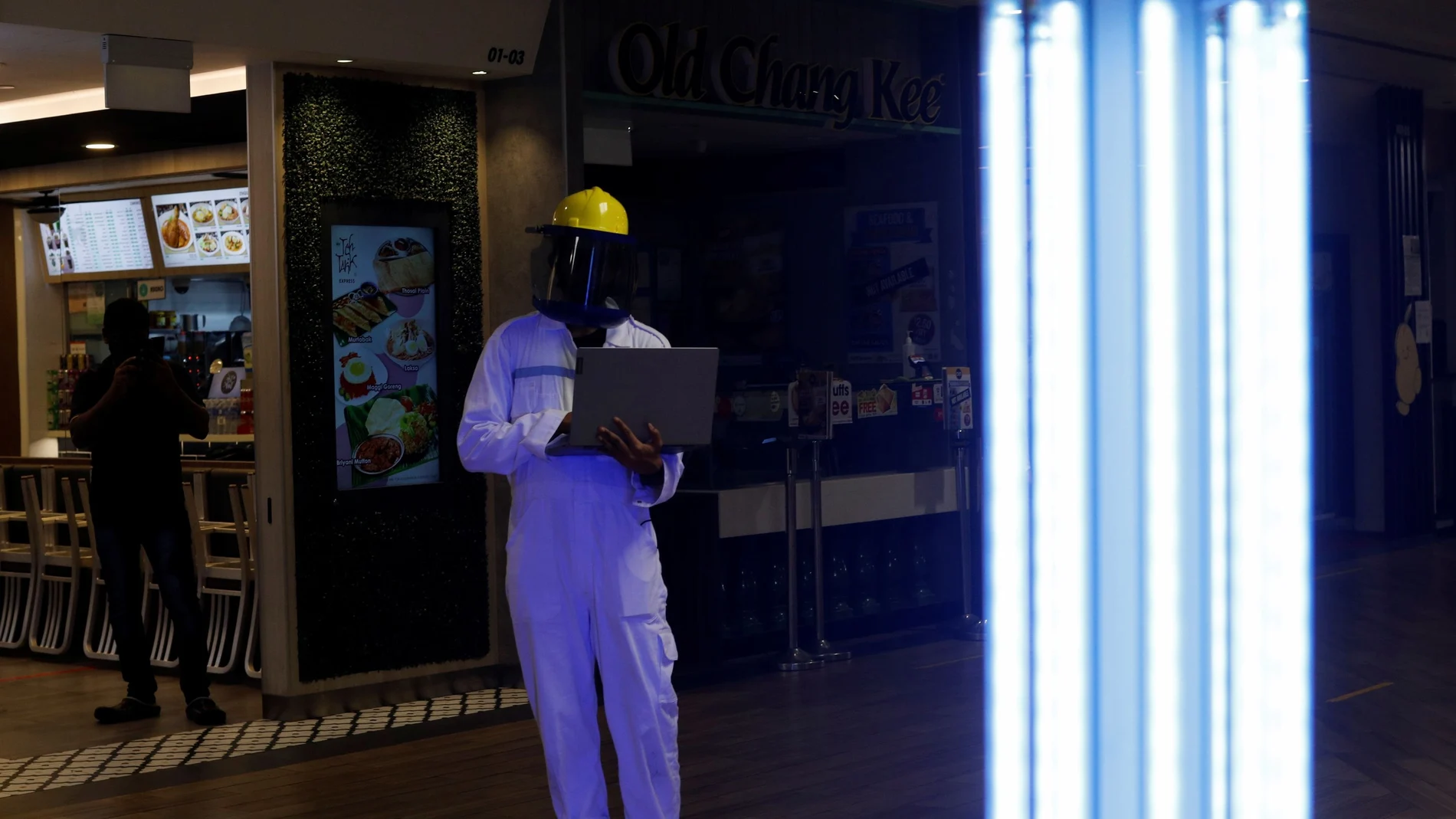 An autonomous mobile robot that disinfects surfaces with ultraviolet light, known as Sunburst UV Bot, is deployed at Northpoint City shopping mall amid the coronavirus disease (COVID-19) outbreak in Singapore