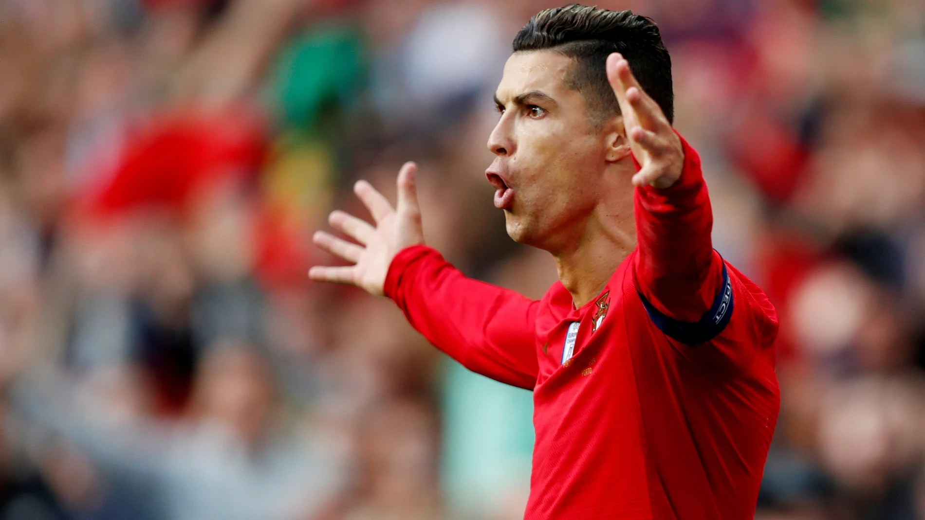 FILE PHOTO: Cristiano Ronaldo celebrates the first of his three goals in Portugal's 3-1 win over Switzerland in the UEFA Nations League semi-final at Estadio do Dragao in Porto.