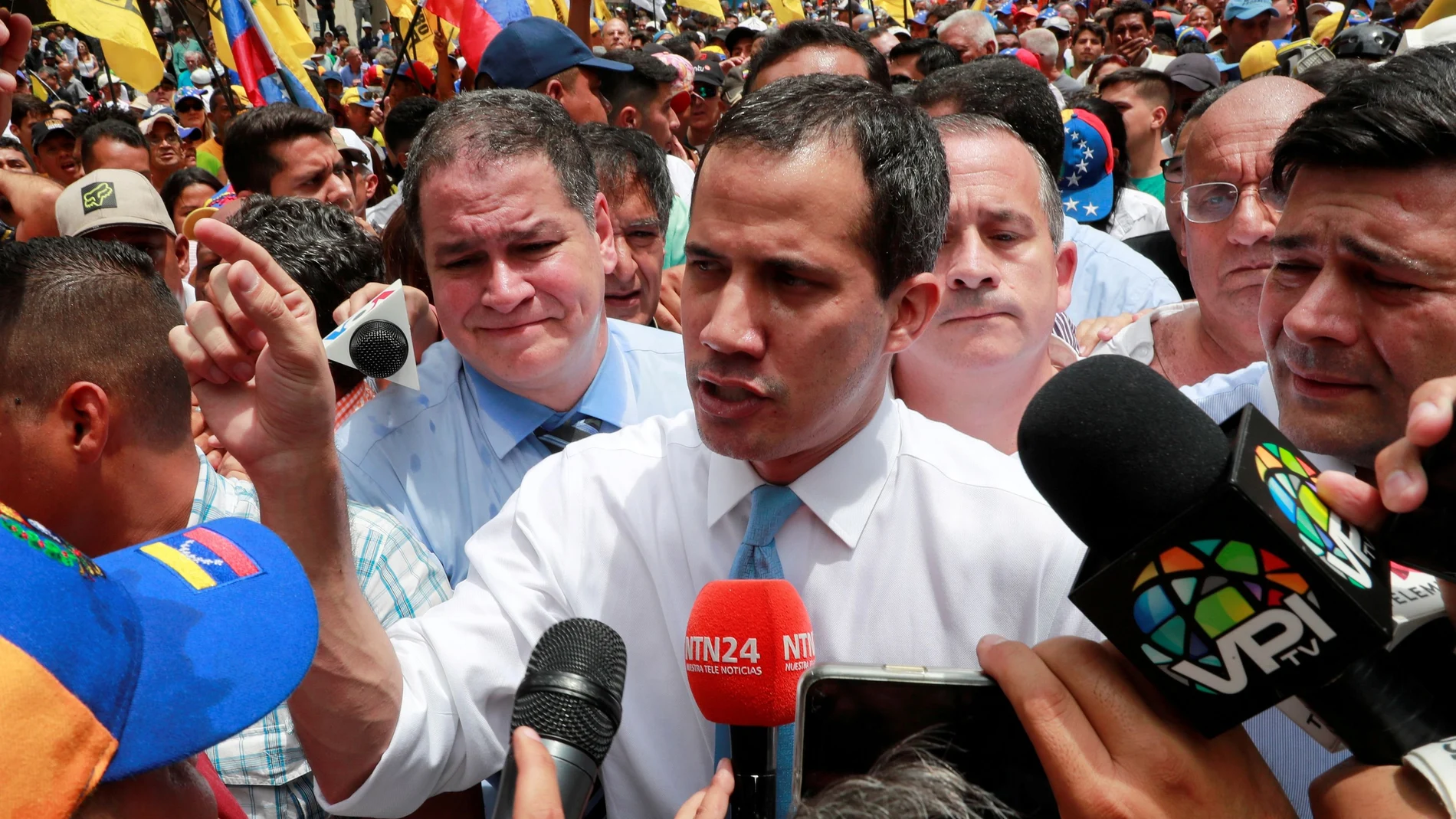 FILE PHOTO: Venezuela's National Assembly President and opposition leader Juan Guaido, who many nations have recognised as the country's rightful interim ruler, takes part in a demonstration in Caracas