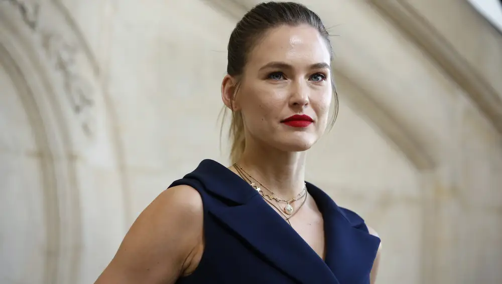 FILE - In this Feb. 26, 2019 file photo, Israeli top model Bar Refaeli poses for photographers at the Dior ready to wear Fall-Winter 2019-2020 collection, in Paris. Refaeli has signed a plea bargain agreement with authorities to settle a long-standing tax evasion case against her and her family. The deal will require Refaeli to serve nine months of community service while her mother will be sent to prison for 16 months. The two are also ordered to pay a $1.5 million fine on top of millions of back taxes owed to the state. (AP Photo/Thibault Camus, File)