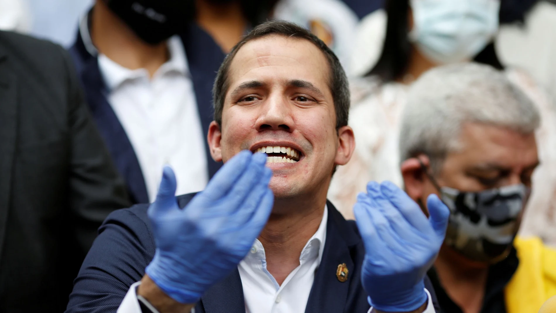 FILE PHOTO: Venezuelan opposition leader Juan Guaido speaks during a news conference after Venezuela's pro-government supreme court replaced the leaders of two key opposition parties, months ahead of legislative elections in Caracas