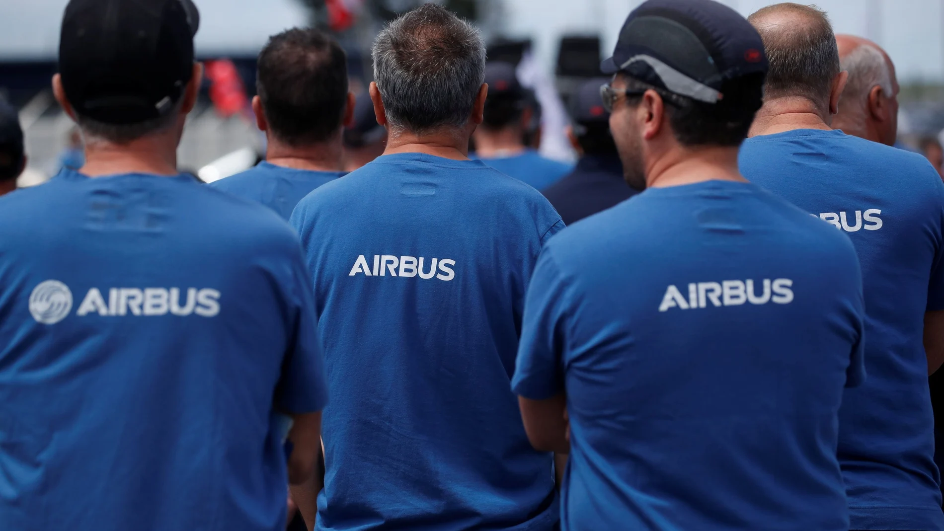 Airbus employees gather outside the Airbus facility in Montoir-de-Bretagne near Saint-Nazaire