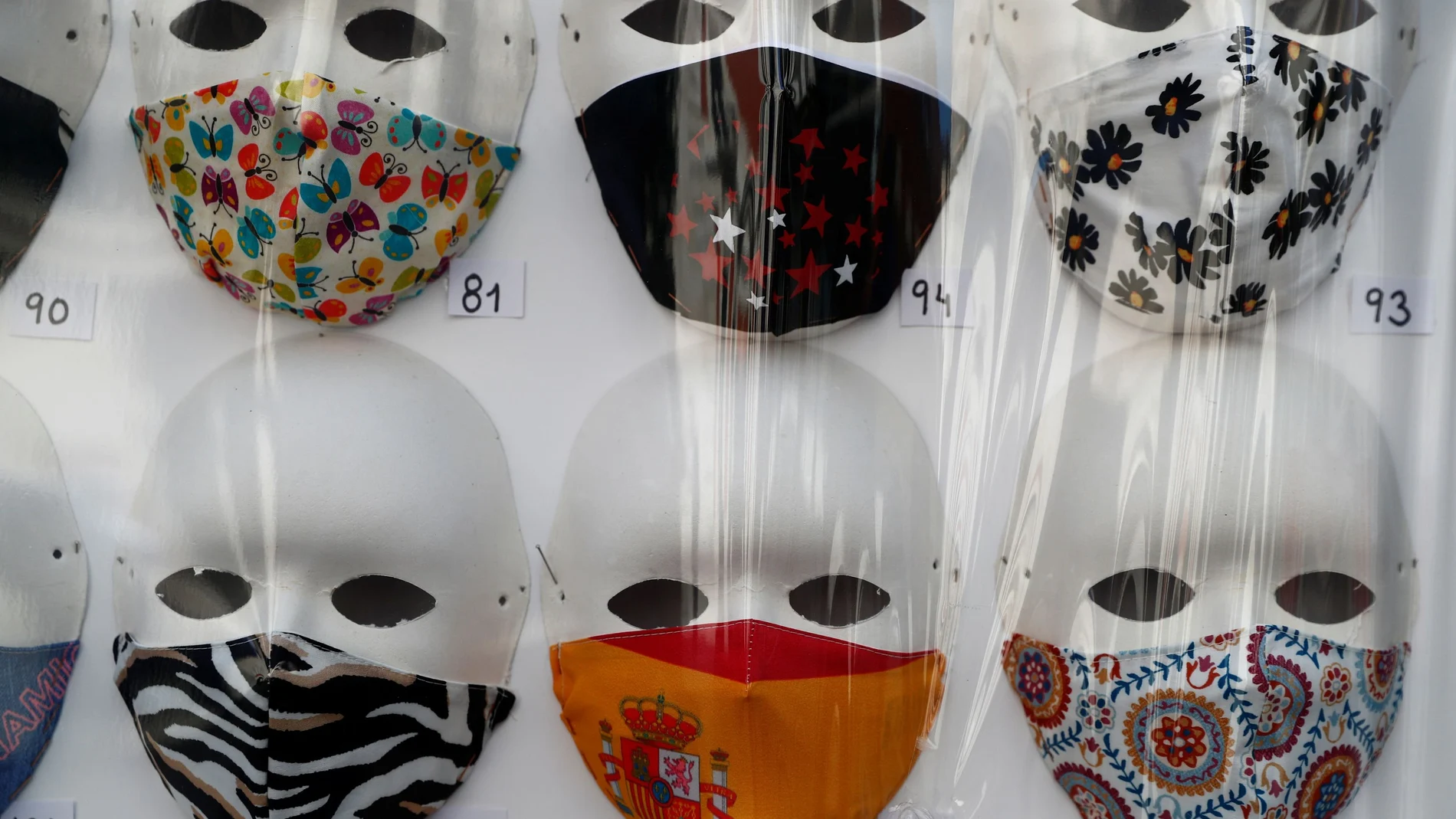 Protective masks are displayed in a store, amid the coronavirus disease (COVID-19) outbreak, in Madrid, Spain, June 30, 2020. REUTERS/Susana Vera