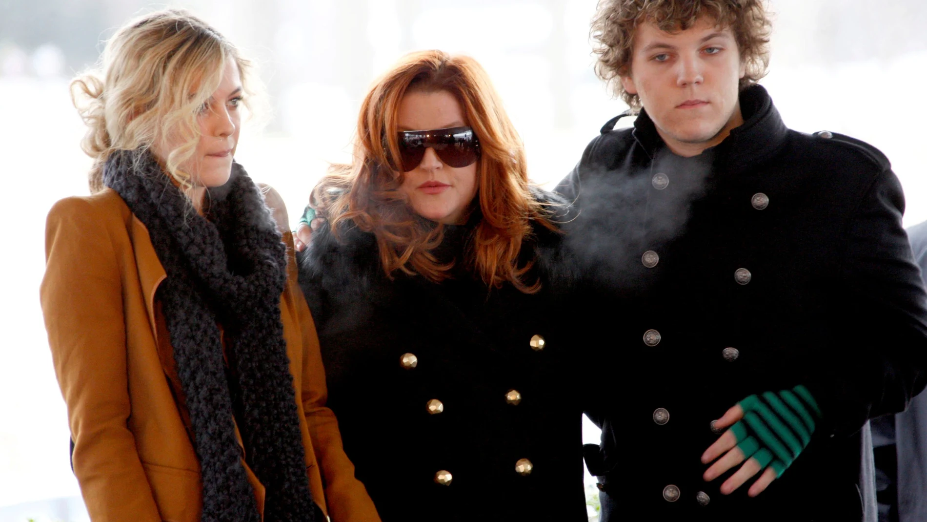 FILE PHOTO: Lisa Marie Presley, with her children Riley and Benjamin Keough, attend the 75th birthday celebration for Elvis Presley in Memphis