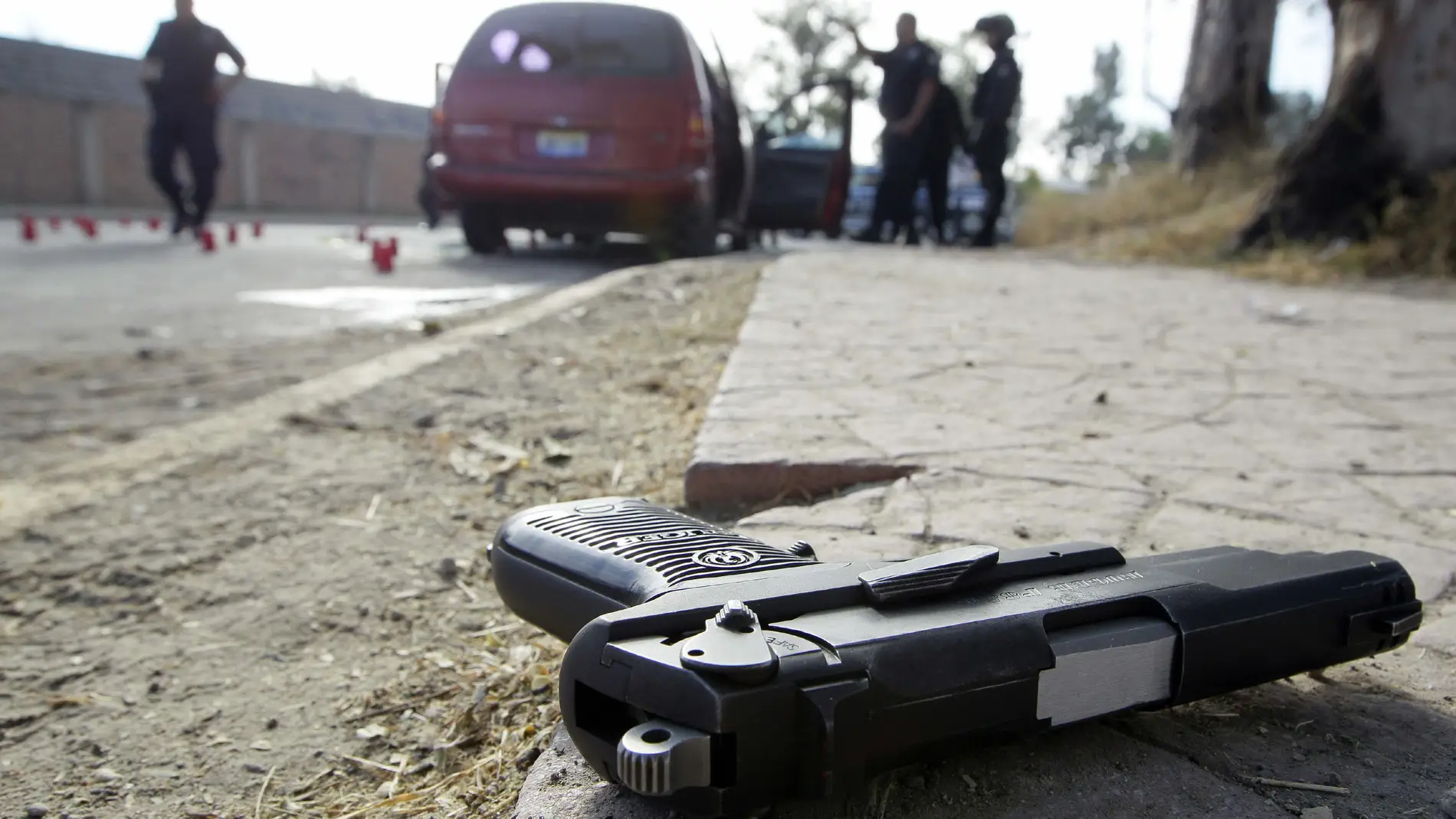 Escena de un crimen cometido por sicarios en México en una foto de archivo