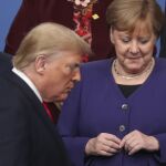 Trump y Merkel, durante una cumbre de la OTAN