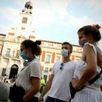Calles de Madrid con gente con mascarilla