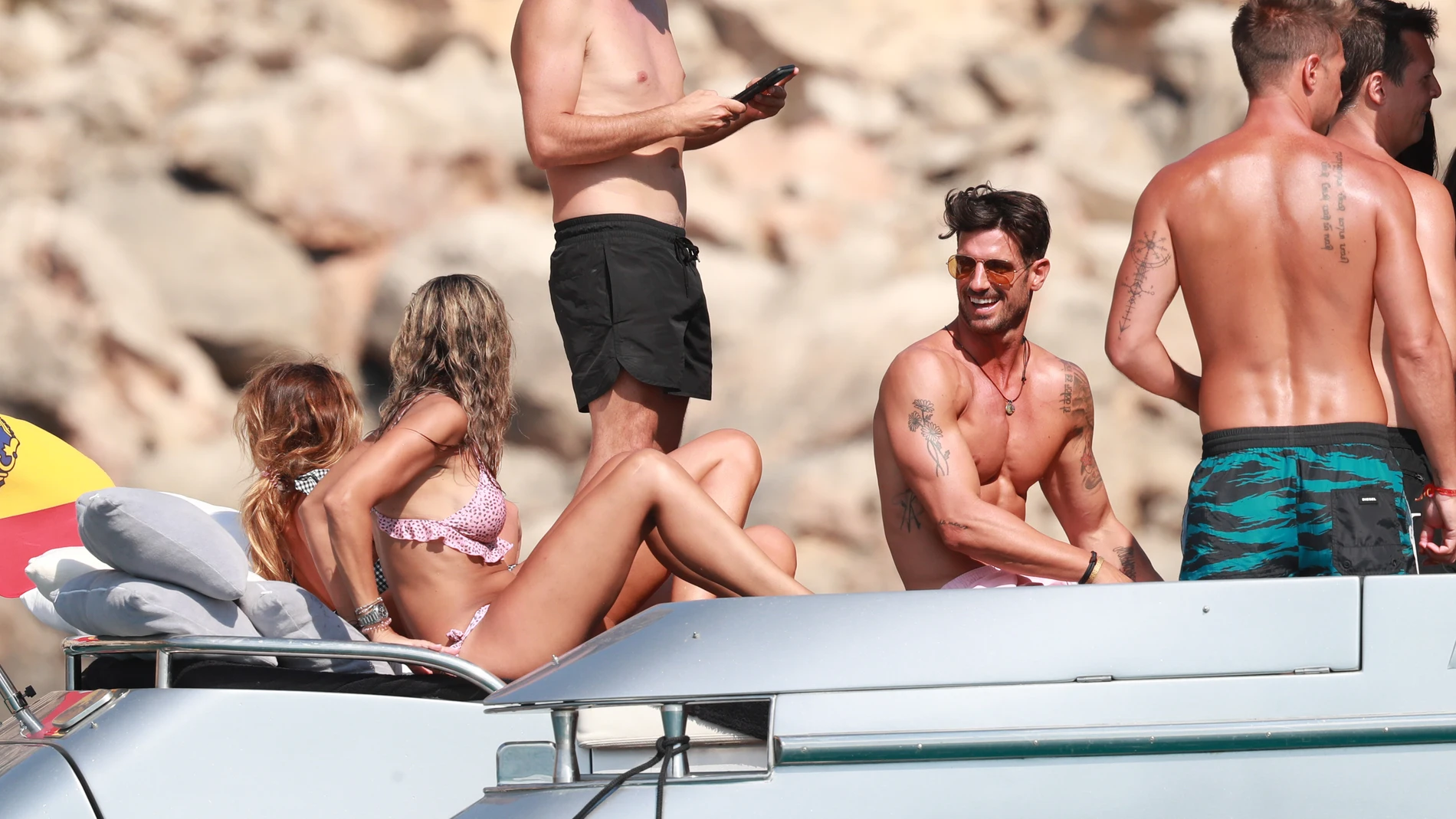 Former soccerplayer Aitor Ocio and female friend on holidays in Ibiza.