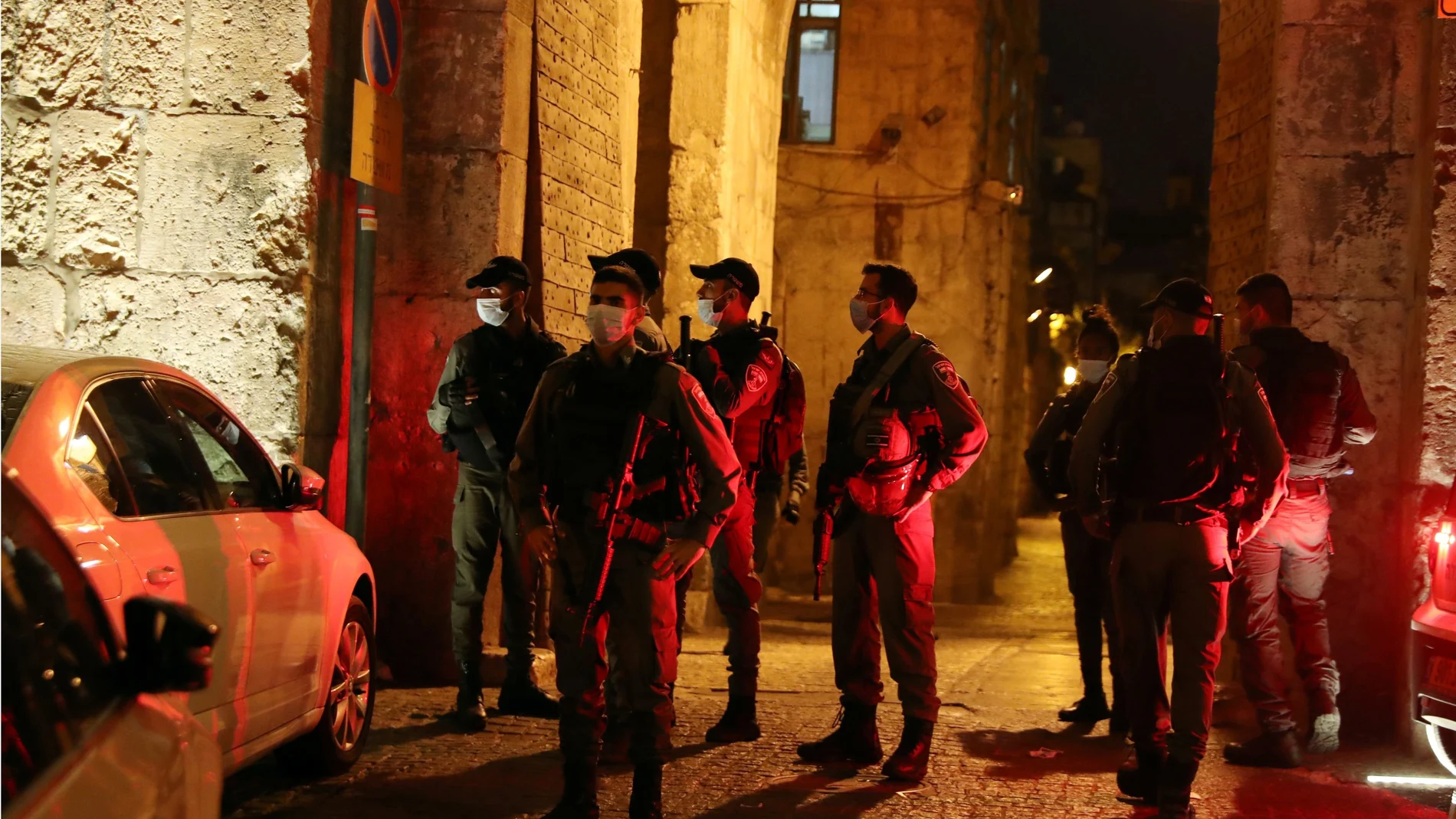 Israeli security personnel secure an entrance to Jerusalem's Old City following a suspected stabbing attack