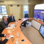 HANDOUT - 20 August 2020, Argentina, Buenos Aires: Argentine president Alberto Fernandez (2nd L) holds a virtual meeting with Pascal Soriot, global CEO of AstraZeneca laboratory. An Argentine company signed agreements with AstraZeneca to manufacture and distribute an eventual Coronavirus vaccine in Latin America. Photo: Esteban Collazo/Presidencia Argentina/dpa - ATENCIÓN: Sólo para uso editorial y mencionando el crédito completo20/08/2020 ONLY FOR USE IN SPAIN