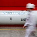 FILE PHOTO: The logo of the Nord Stream 2 gas pipeline project is seen on a large diameter pipe at Chelyabinsk Pipe Rolling Plant owned by ChelPipe Group in Chelyabinsk, Russia February 26, 2020. Picture taken February 26, 2020. REUTERS/Maxim Shemetov/File Photo