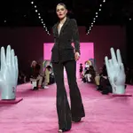 FILE - The Christian Siriano collection is modeled during Fashion Week in New York on Feb. 6, 2020. With no celebs in the front row, no paparazzi chasing models down the streets, no stiletto-heeled crowds and no live shows at all, is there even a point to doing Fashion Week in 2020? Well, yes, say organizers: Itâ€™s about business. And jobs. And survival. (AP Photo/John Minchillo, File)