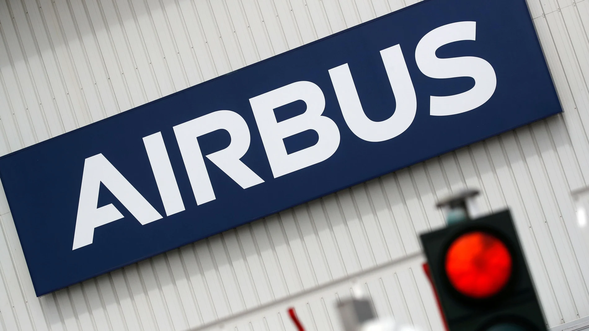 FILE PHOTO: Airbus logo at the entrance of the Airbus facility in Bouguenais