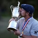 Sep 20, 2020; Mamaroneck, New York, USA; Bryson DeChambeau poses and celebrates with the trophy after winning the U.S. Open golf tournament at Winged Foot Golf Club - West. Mandatory Credit: Danielle Parhizkaran-USA TODAY Sports