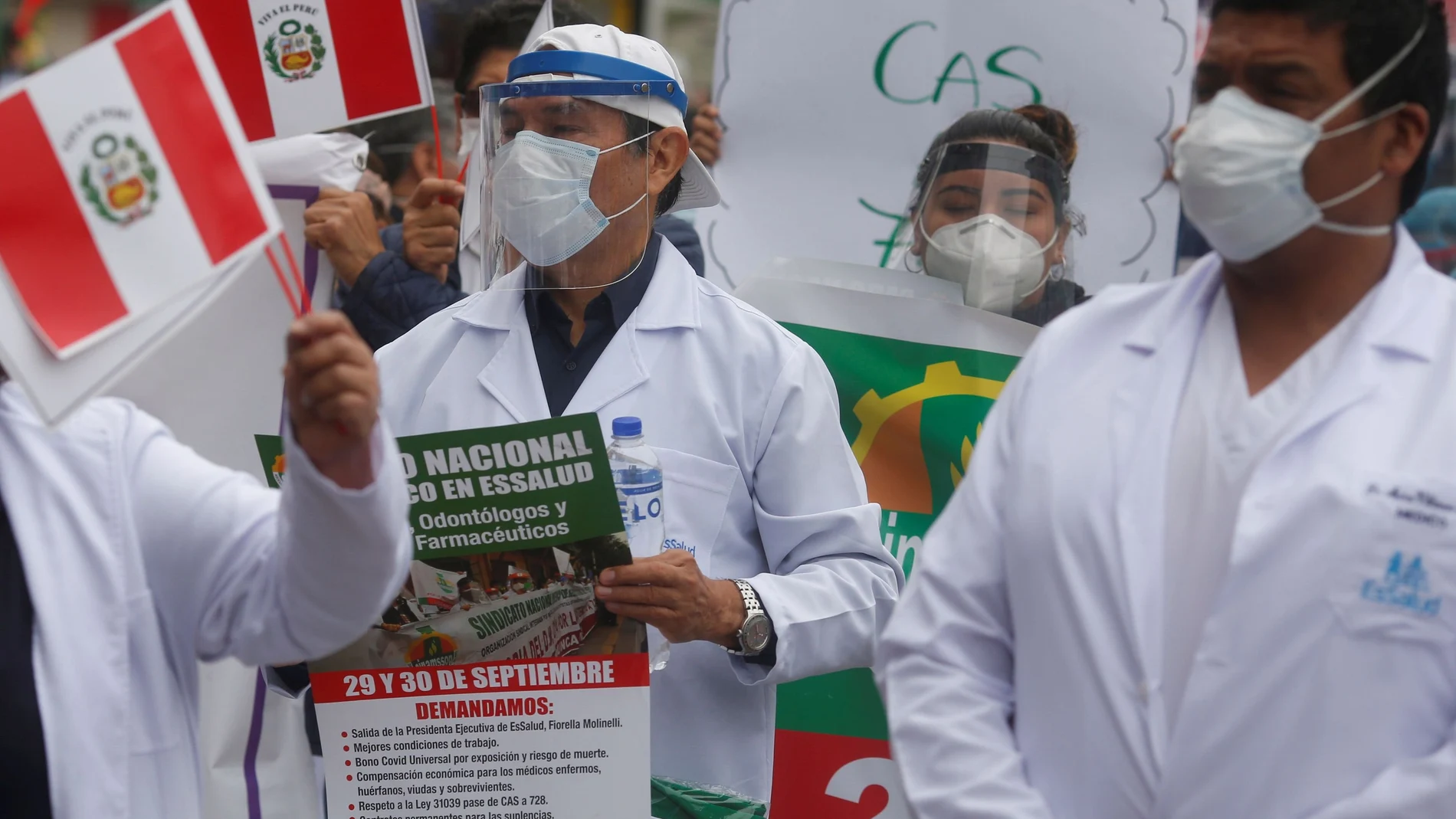 Health workers demand better working conditions and greater access to personal protective gear when treating patients suffering from the coronavirus disease (COVID-19) during a national strike, in Lima, Peru September 29, 2020. REUTERS/Sebastian Castaneda NO RESALES. NO ARCHIVES
