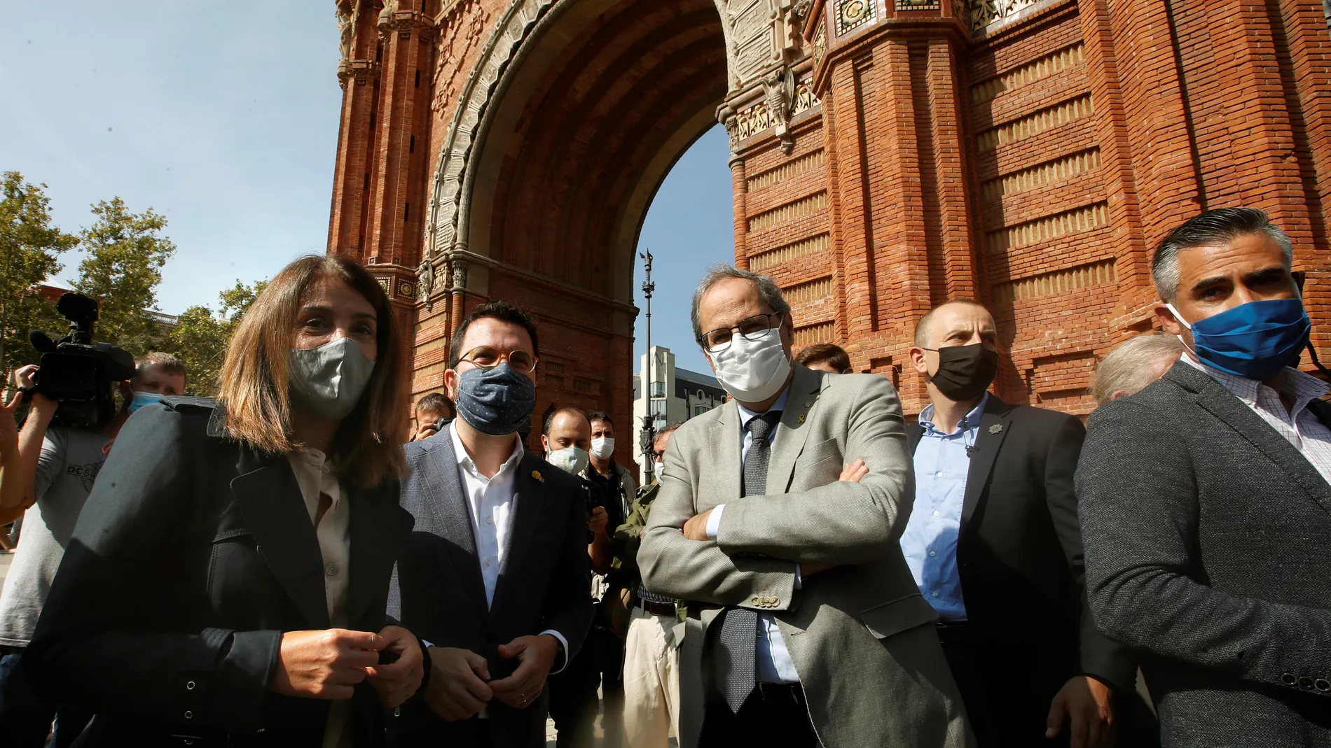 El expresidente de la Generalitat Quim Torra, y su sustituto interino, el republicano Pere Aragonès, durante el acto en el que entidades y partidos independentistas han conmemorado este miércoles el tercer aniversario del referéndum unilateral del 1-O