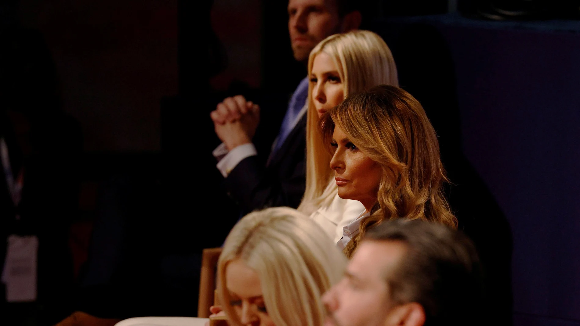 U.S. first lady Melania Trump watches after taking off her face mask while sitting with the rest of the Trump family, including Donald Trump Jr., Tiffany Trump, Ivanka Trump and Eric Trump, before the start of the first 2020 presidential campaign debate between U.S. President Donald Trump and Democratic presidential nominee Joe Biden in Cleveland, Ohio, U.S., September 29, 2020. Picture taken September 29, 2020. REUTERS/Brian Snyder