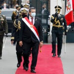10 November 2020, Peru, Lima: President of Congress Manuel Merino (C) walks outside the Congress building after being sworn-in as Peru's new president, replacing Martin Vizcarra who was removed by lawmakers. Photo: Mariana Bazo/ZUMA Wire/dpa10/11/2020 ONLY FOR USE IN SPAIN
