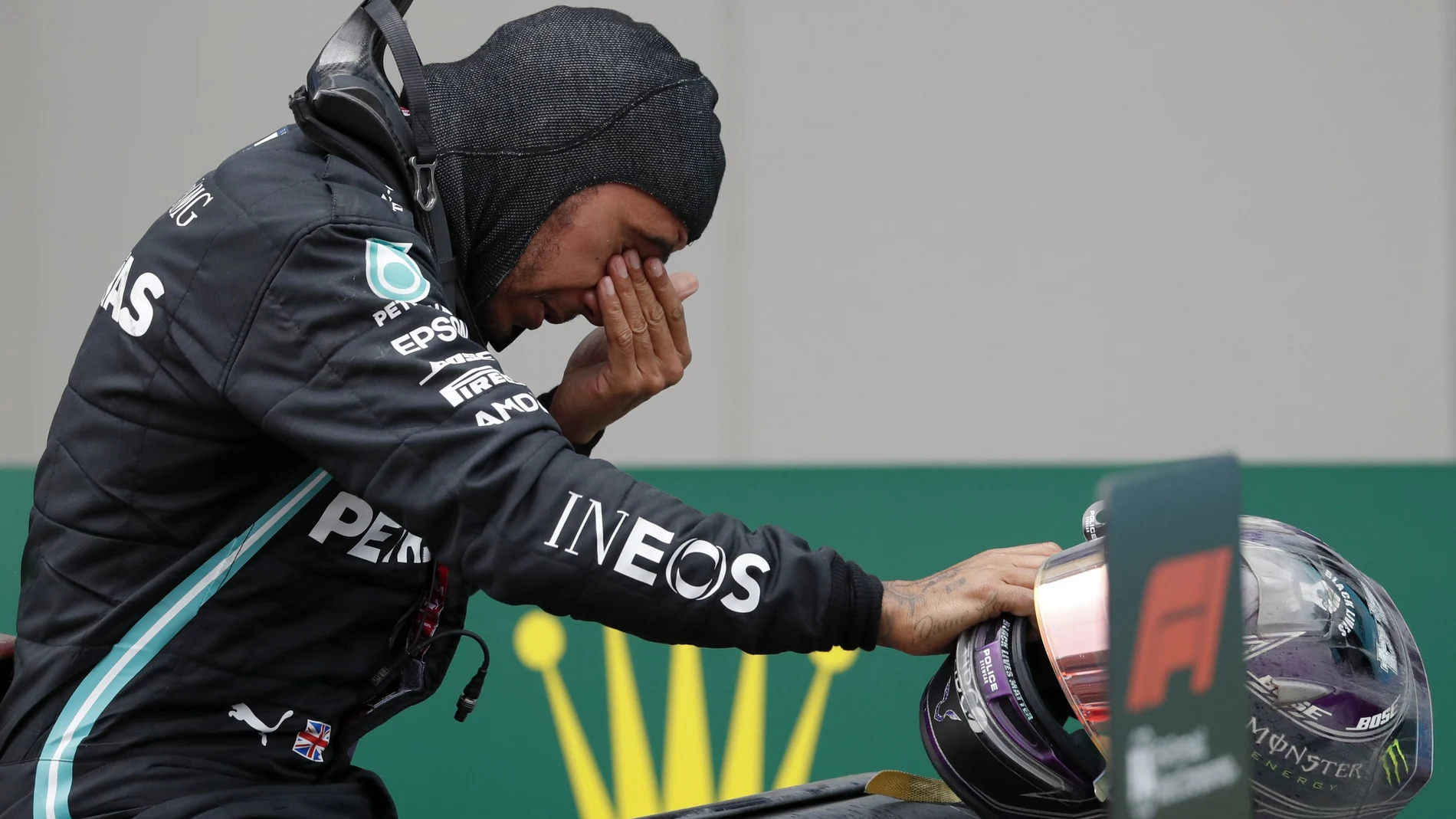 Mercedes driver Lewis Hamilton of Britain reacts after winning the Turkish Formula One Grand Prix at the Istanbul Park circuit racetrack in Istanbul, Sunday, Nov. 15, 2020. (Murad Sezer/Pool via AP)