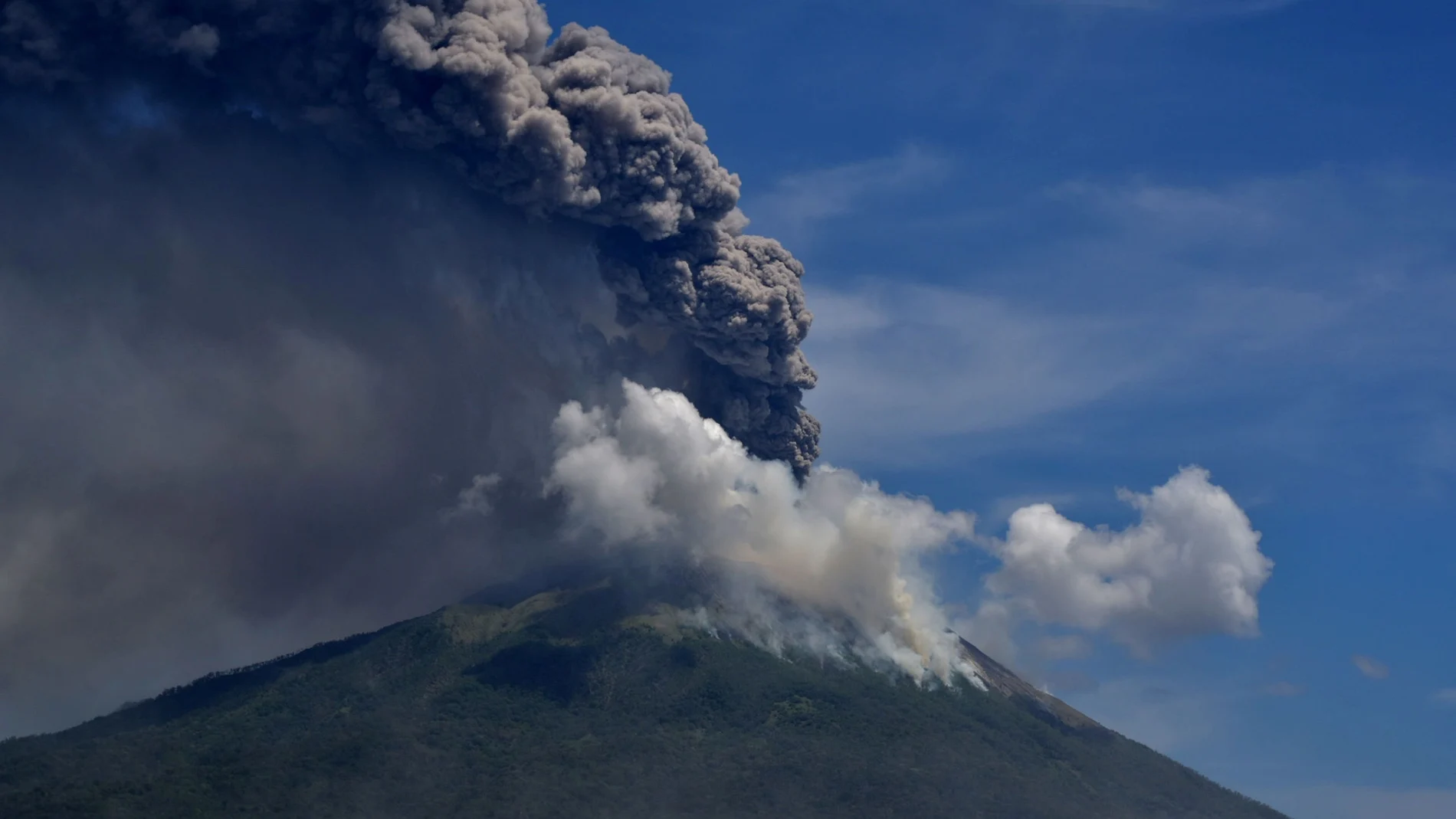 An eruption of Mount Ile Lewotolok is seen in Lembata, East Nusa Tenggara Province, Indonesia November 29, 2020. in this photo taken by Antara Foto/Aken Udjan via Reuters. ATTENTION EDITORS - THIS IMAGE WAS PROVIDED BY THIRD PARTY. MANDATORY CREDIT. INDONESIA OUT.