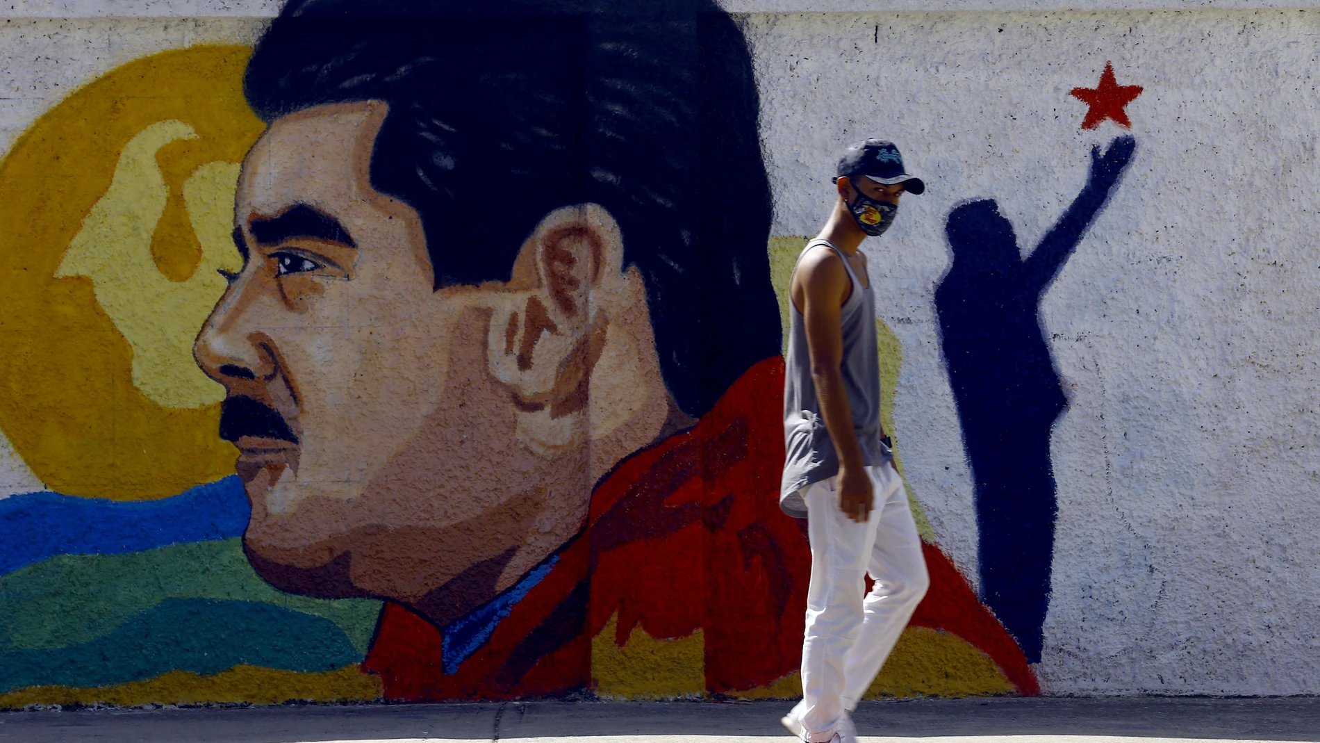 Un mural de Nicolás Maduro en una calle de Venezuela