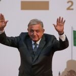 Mexico's President Andres Manuel Lopez Obrador waves after addressing to the nation on his second anniversary as the President of Mexico, at the National Palace in Mexico City, Mexico, December 1, 2020. REUTERS/Henry Romero