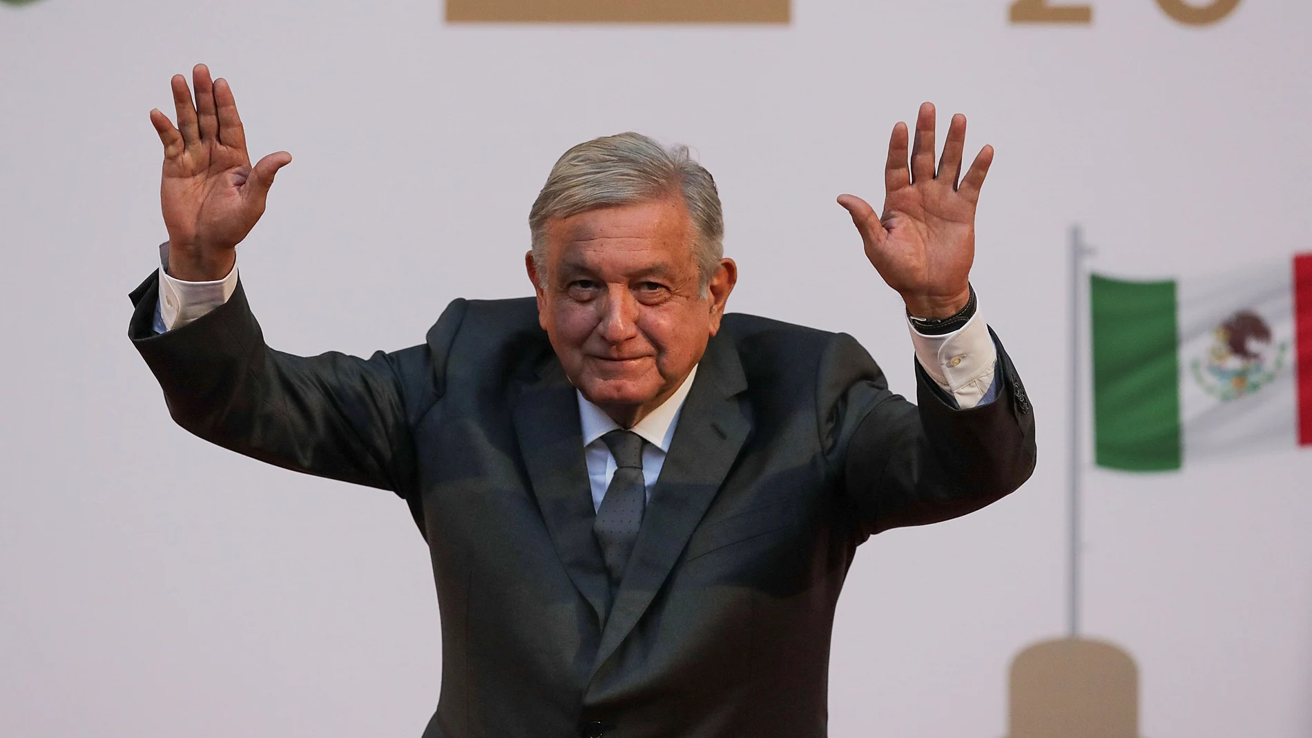 Mexico's President Andres Manuel Lopez Obrador waves after addressing to the nation on his second anniversary as the President of Mexico, at the National Palace in Mexico City, Mexico, December 1, 2020. REUTERS/Henry Romero