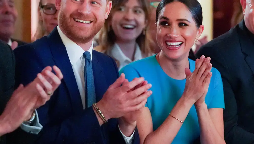 FILE PHOTO: Britain's Prince Harry and his wife Meghan, Duchess of Sussex, cheer during the annual Endeavour Fund Awards at Mansion House in London, Britain March 5, 2020. Paul Edwards/Pool via REUTERS/File Photo