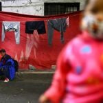 A homeless eats during a traditional Mexican Christmas celebration known as "Posada mexicana" at Santa Maria la Ribera neighbourhood, as the outbreak of the coronavirus disease (COVID-19) continues in Mexico City, Mexico December 16, 2020. REUTERS/Edgard Garrido