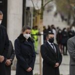 Spain's King Felipe VI, left, Queen Letizia, second left, and Spain's Health Minister Salvador Illa, right, attend the unveiling of a monument to late health workers during the coronavirus pandemic in Madrid, Spain, Friday, Dec. 18, 2020. (AP Photo/Manu Fernanez, Pool)