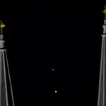 Saturno, arriba y Júpiter, abajo, enmarcados entre los campanarios gemelos de la Iglesia Católica St. Joseph el sábado 19 de diciembre de 2020 en Topeka, Kansas