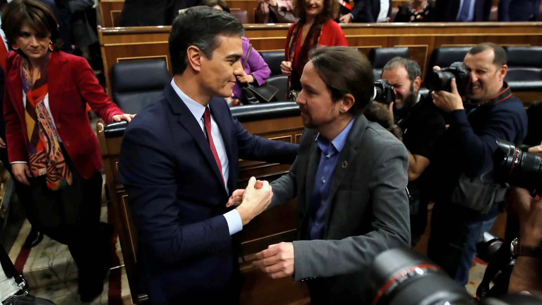 El presidente del Gobierno, Pedro Sánchez, junto al líder de Unidas Podemos, Pablo Iglesias