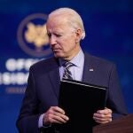 President-elect Joe Biden leaves after speaking at The Queen theater, Monday, Dec. 28, 2020, in Wilmington, Del. (AP Photo/Andrew Harnik)