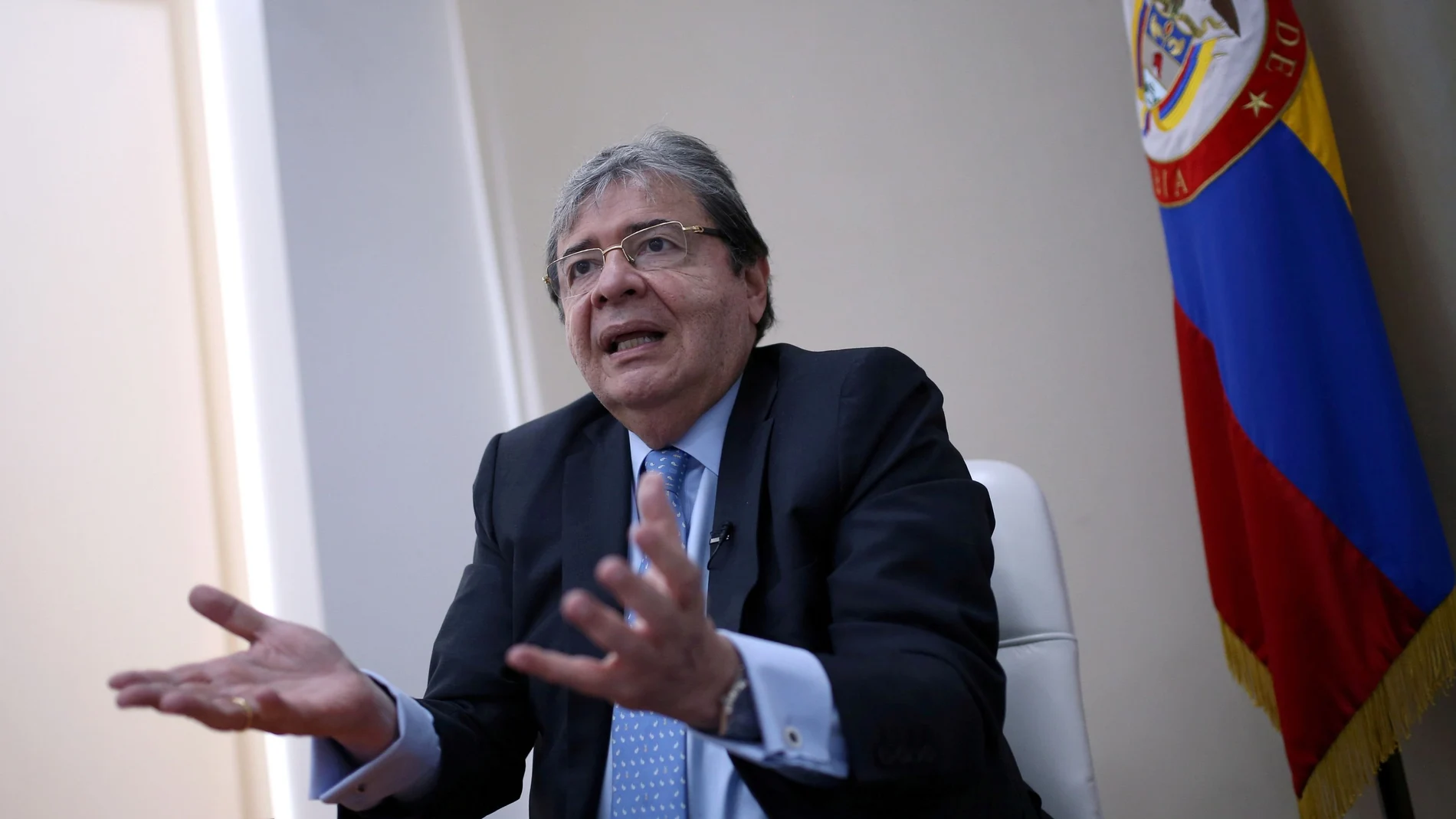 FILE PHOTO: Colombian Minister of Defense Carlos Holmes Trujillo speaks during an interview with Reuters in Bogota, Colombia November 27, 2020. Picture taken November 27, 2020. REUTERS/Luisa Gonzalez/File Photo